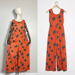 Anthropologie Bel Kazan “Felizia” jumpsuit in orange floral print